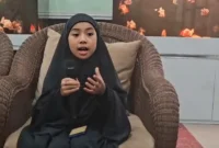 isyah Ar Rumy, siswi kelas IV SD Tahfidz Alquran Daarul Ukhuwwah, Kabupaten Malang, yang mewakili Indonesia dalam ajang Dubai International Holy Quran Award di Uni Emirat Arab. (Foto: Tugu Malang)suarabrita.com