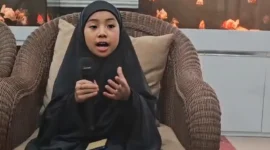 isyah Ar Rumy, siswi kelas IV SD Tahfidz Alquran Daarul Ukhuwwah, Kabupaten Malang, yang mewakili Indonesia dalam ajang Dubai International Holy Quran Award di Uni Emirat Arab. (Foto: Tugu Malang)suarabrita.com